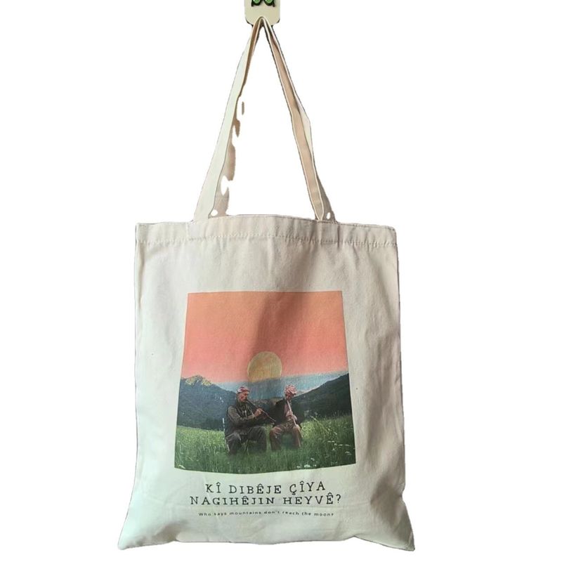 Sac à dos en toile de magasinage en couleur personnalisé avec impression personnalisée et style manipulé