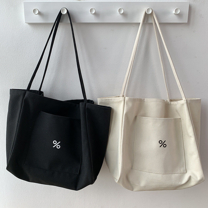 Sac à dos en toile écologique de couleur personnalisée pour femmes Grande capacité et OEM / ODM acceptable
